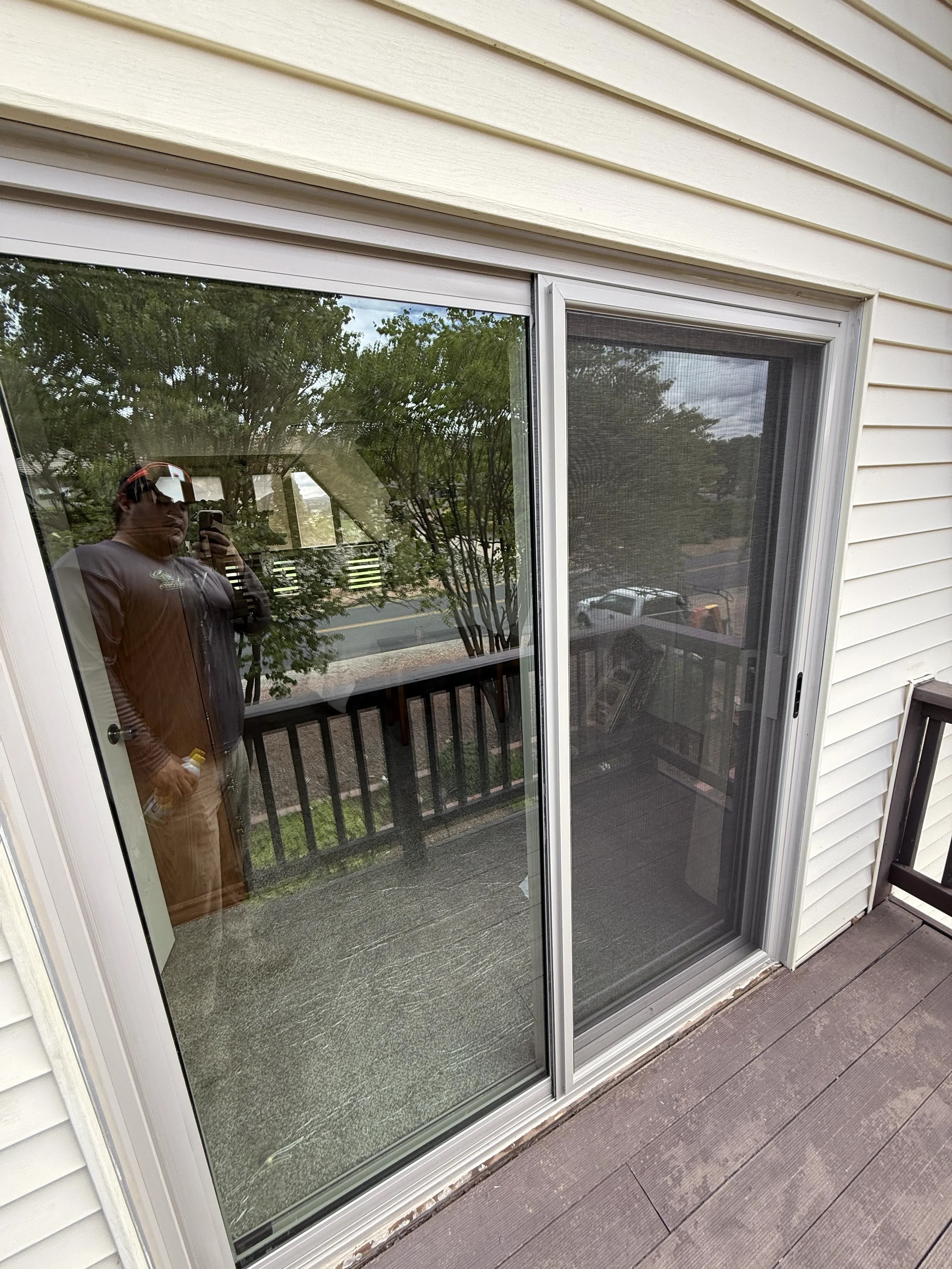 Exterior view of the new sliding patio door on the A-frame home