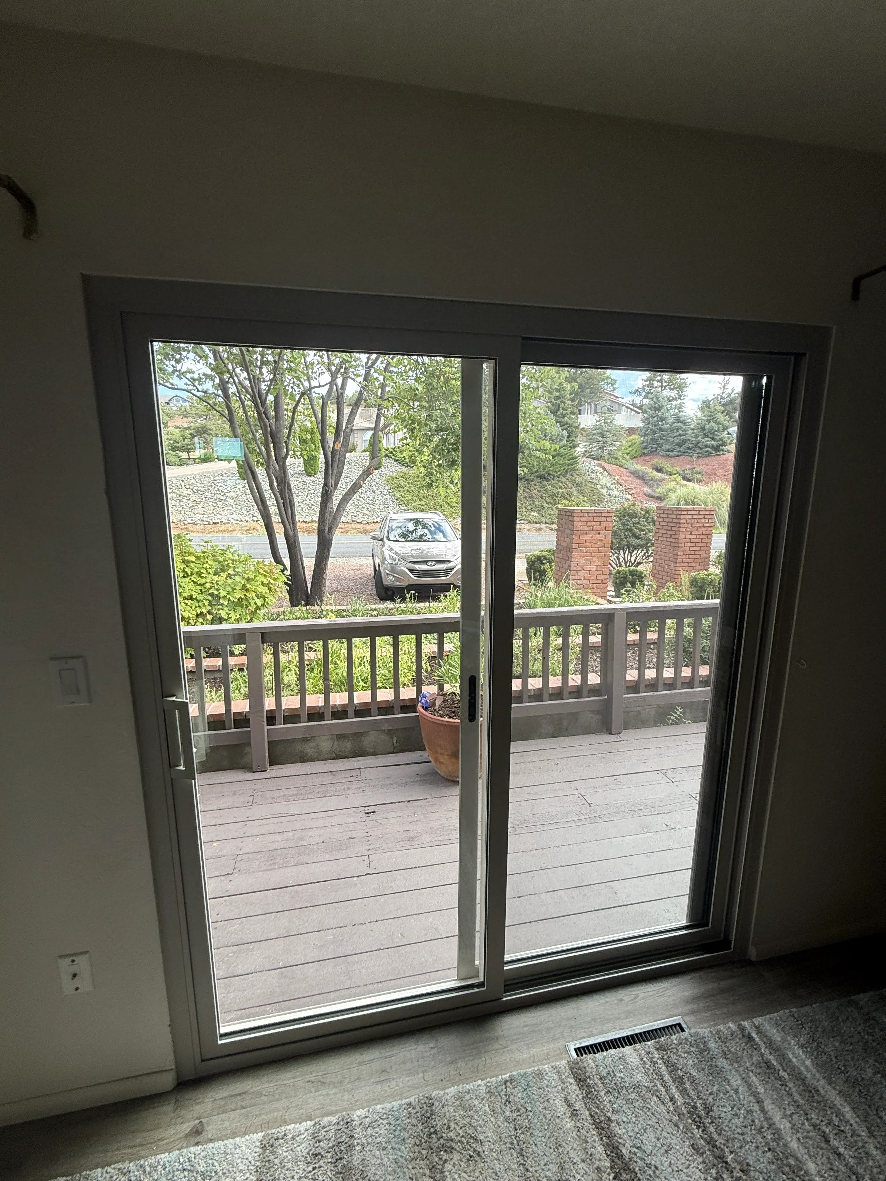 Interior view through the new sliding patio door in the A-frame home