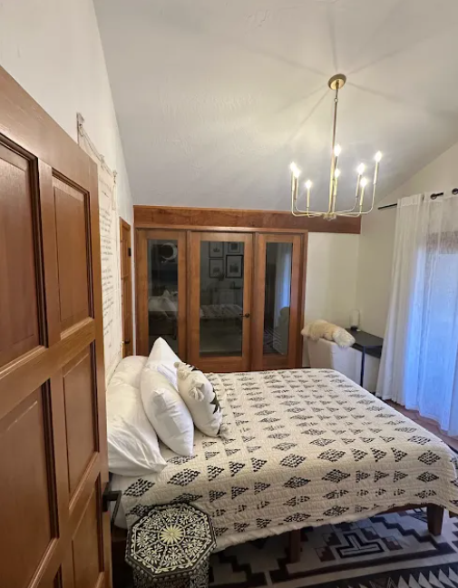 Custom French doors viewed from inside the finished bedroom