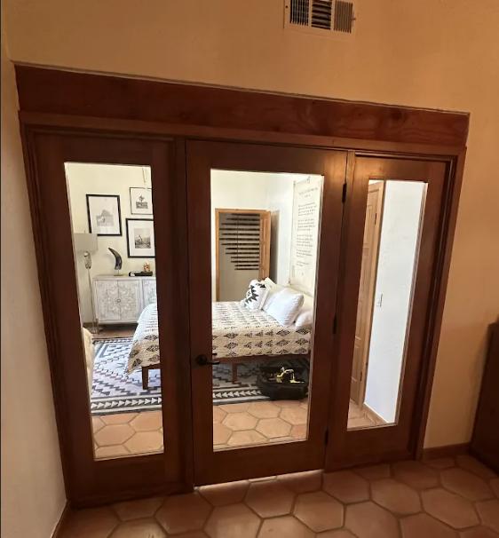 Full front view of the custom interior wood French doors